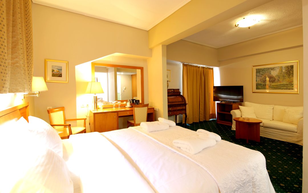 Premium hotel bed setup with crisp linens in elegant Livadia suite